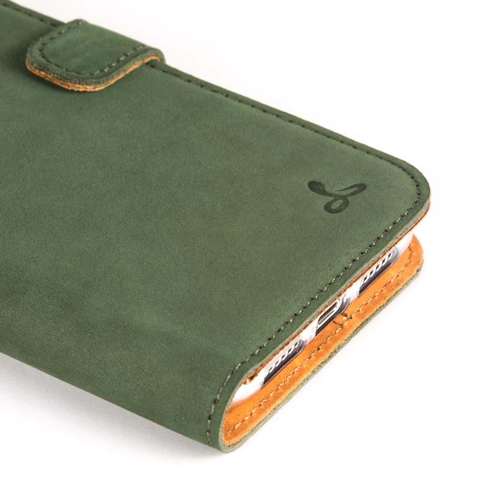 iPhone XR green leather wallet case close up of logo